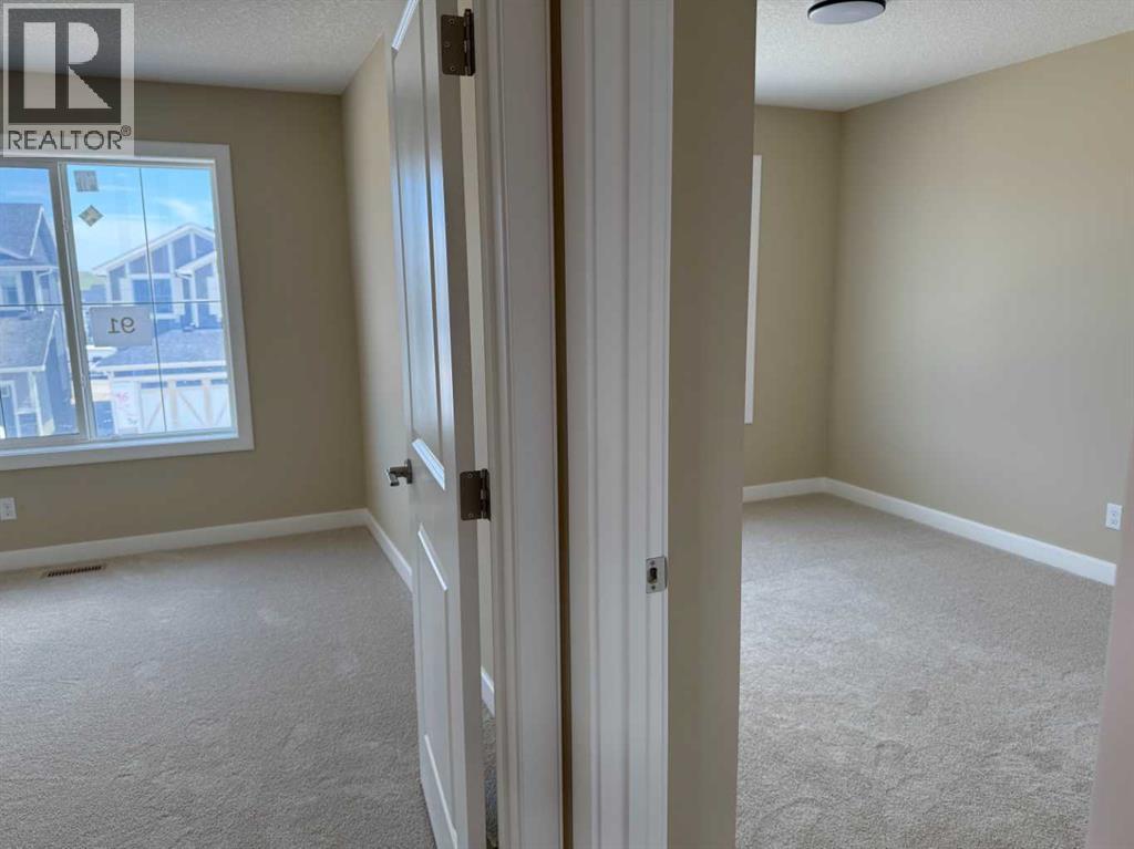 91 Sundown Crescent, Cochrane, Alberta  T4C 1Y3 - Photo 26 - A2228402