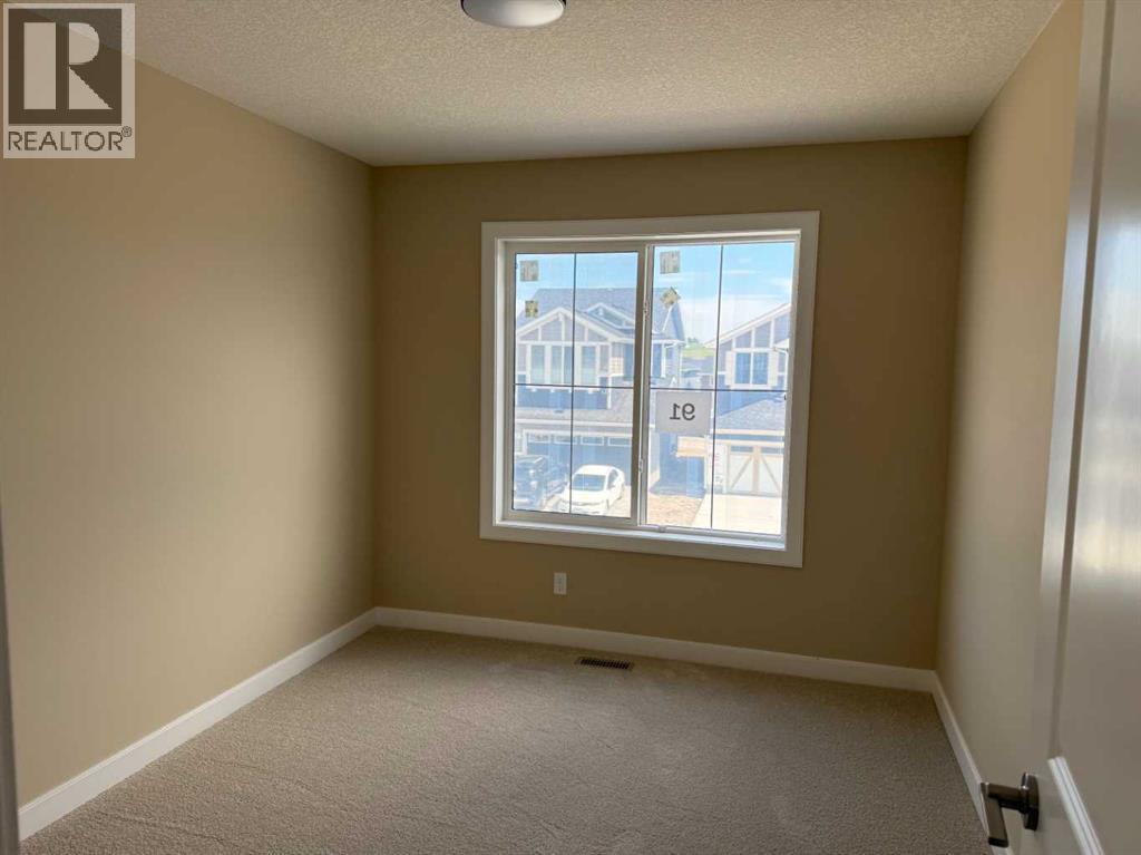 91 Sundown Crescent, Cochrane, Alberta  T4C 1Y3 - Photo 27 - A2228402