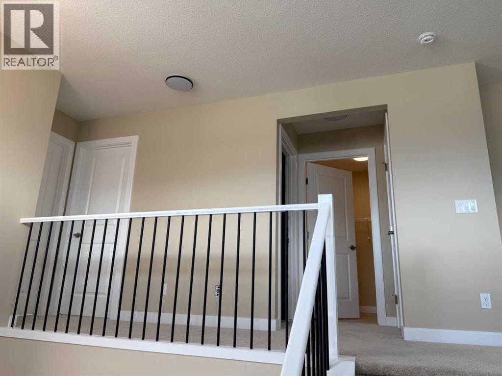 91 Sundown Crescent, Cochrane, Alberta  T4C 1Y3 - Photo 22 - A2228402