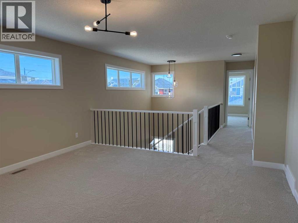 91 Sundown Crescent, Cochrane, Alberta  T4C 1Y3 - Photo 42 - A2228402