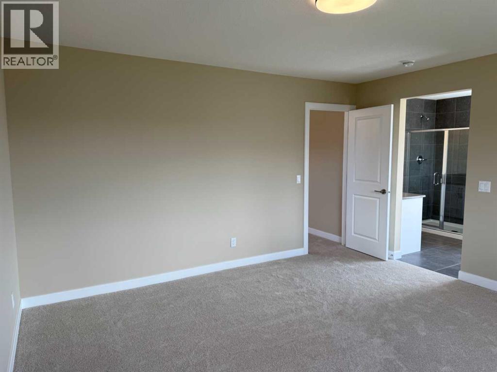 91 Sundown Crescent, Cochrane, Alberta  T4C 1Y3 - Photo 41 - A2228402