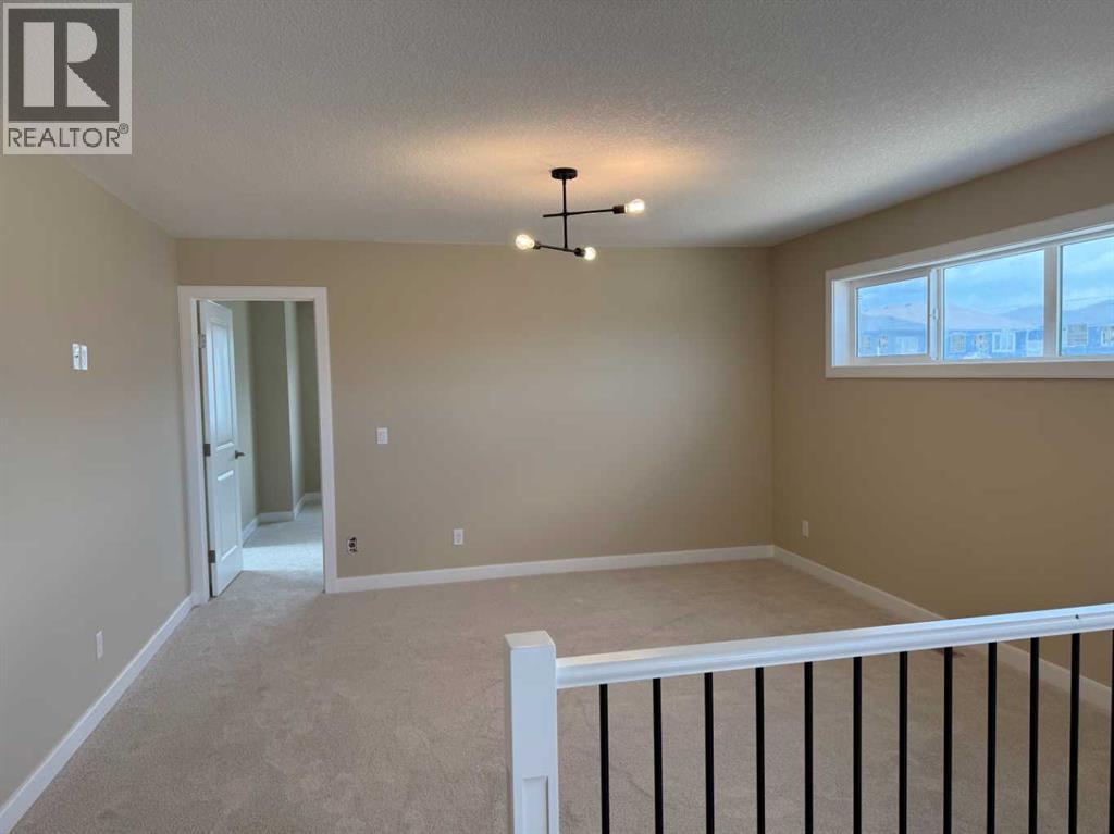 91 Sundown Crescent, Cochrane, Alberta  T4C 1Y3 - Photo 30 - A2228402
