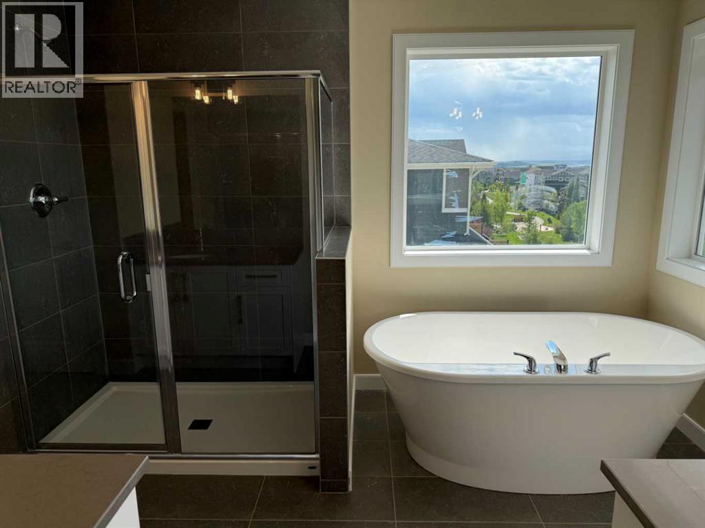 91 Sundown Crescent, Cochrane, Alberta  T4C 1Y3 - Photo 38 - A2228402