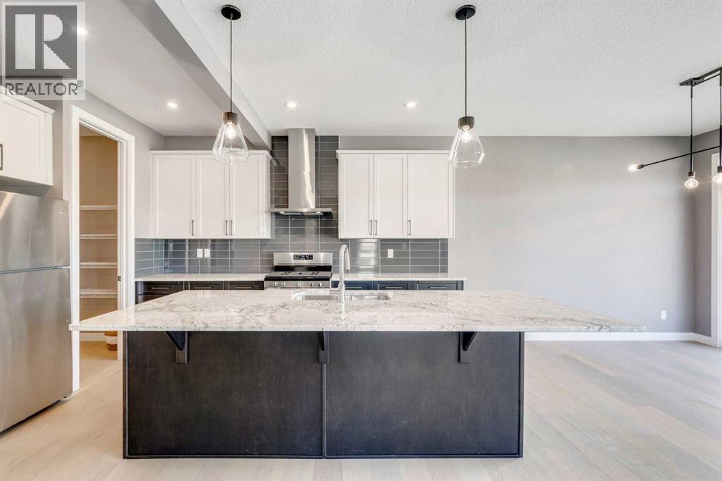 92 Sundown Crescent, Cochrane, Alberta  T4C 1Y3 - Photo 5 - A2228997