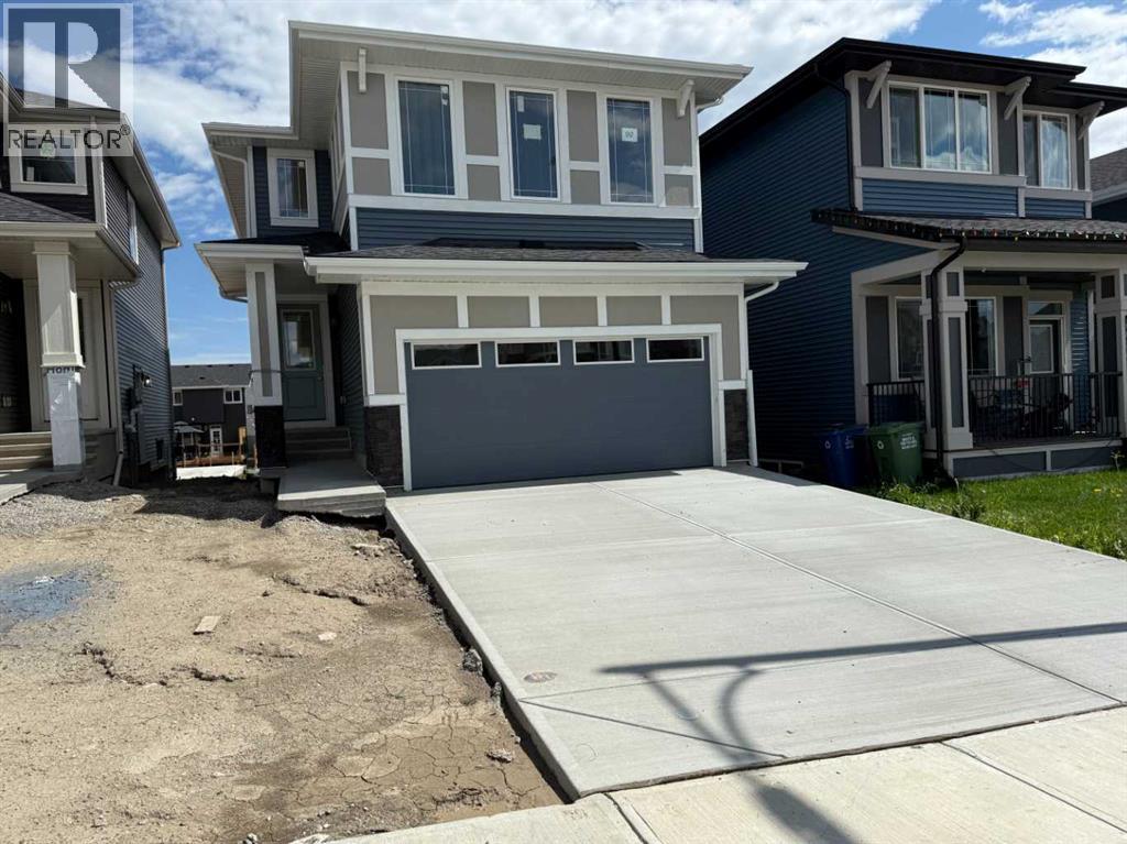 92 Sundown Crescent, Cochrane, Alberta  T4C 1Y3 - Photo 2 - A2228997