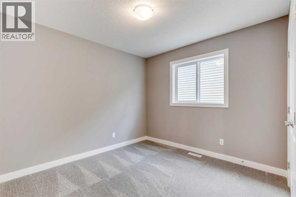 92 Sundown Crescent, Cochrane, Alberta  T4C 1Y3 - Photo 17 - A2228997