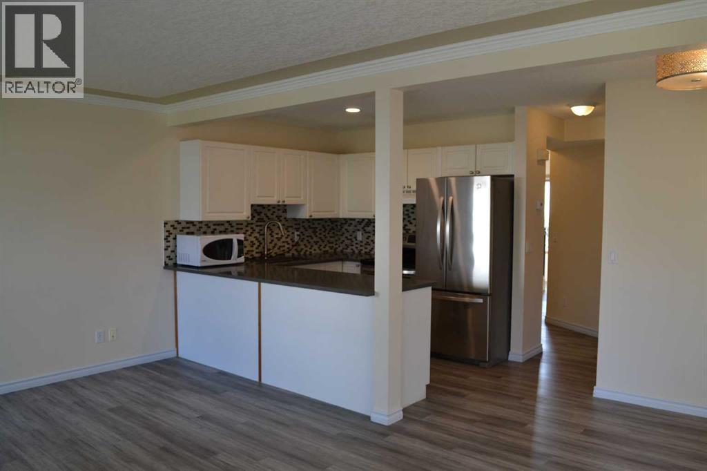 21 Country Hills Rise Nw, Calgary, Alberta  T3K 4S7 - Photo 5 - A2255916