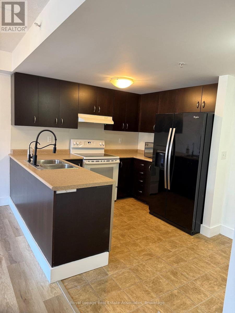 107 - 37 Goodwin Drive, Guelph, Ontario  N1L 0E6 - Photo 3 - X12471680