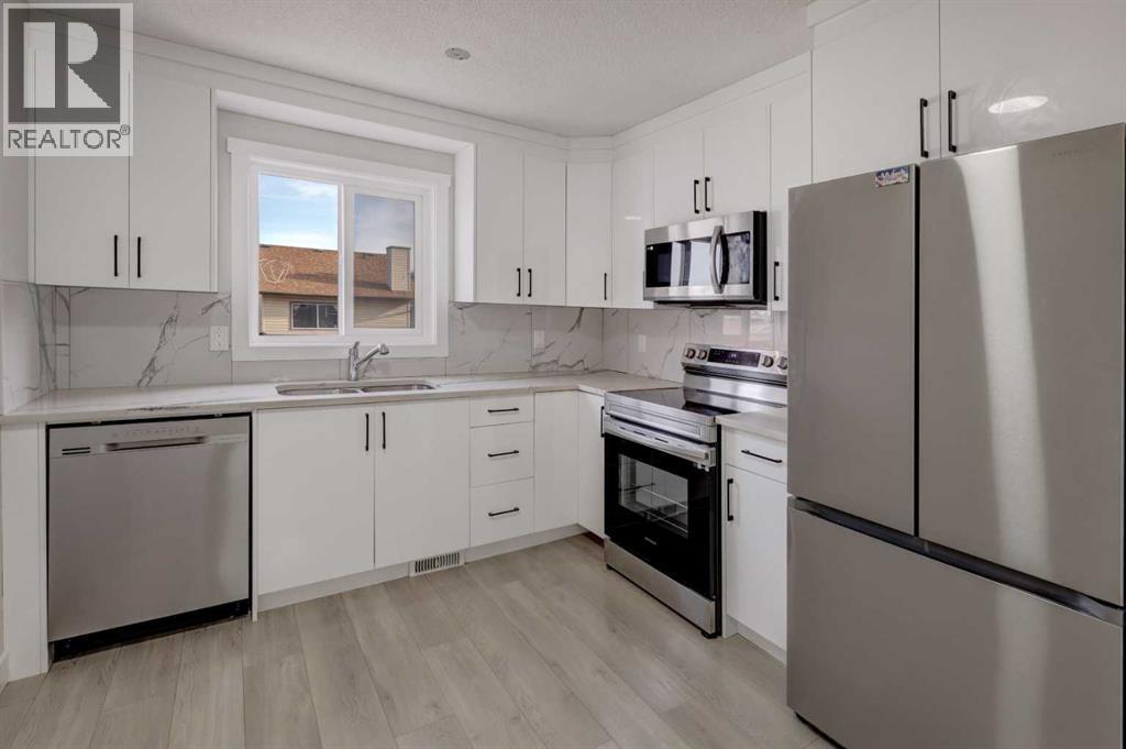 202 Falmere Way Ne, Calgary, Alberta  T3J 2Y1 - Photo 4 - A2264397