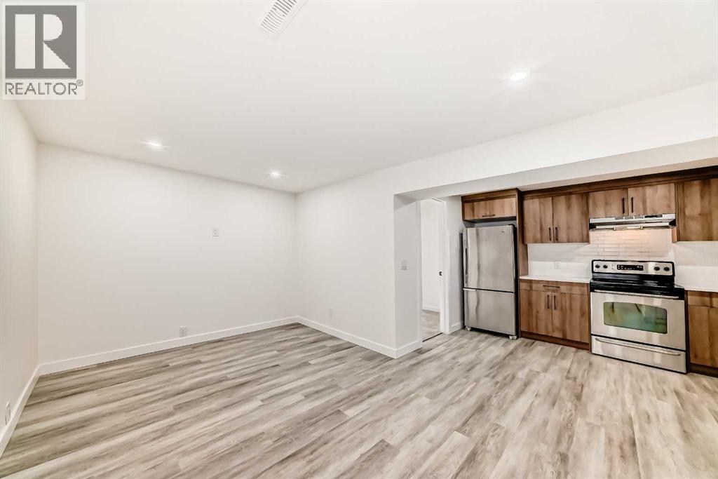 946 Berkley Drive Nw, Calgary, Alberta  T3K 1A2 - Photo 29 - A2264876