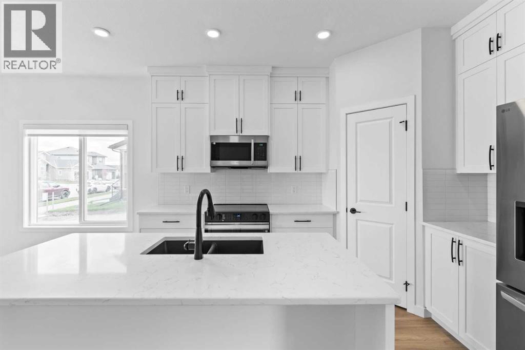 231 Vista Road, Crossfield, Alberta  T0M 0S0 - Photo 9 - A2268976