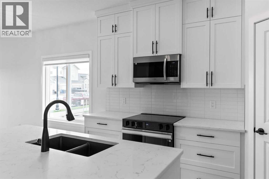 231 Vista Road, Crossfield, Alberta  T0M 0S0 - Photo 11 - A2268976