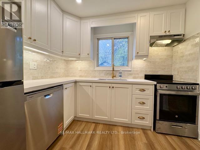 Main Floor/apt#1 - 1700 Gerrard Street, Toronto, Ontario  M4L 2B2 - Photo 18 - E12570668