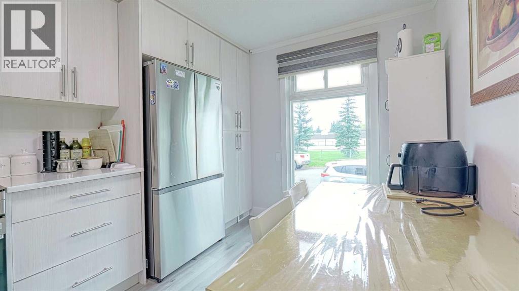 559 Abinger Road Ne, Calgary, Alberta  T2A 6M4 - Photo 5 - A2254920