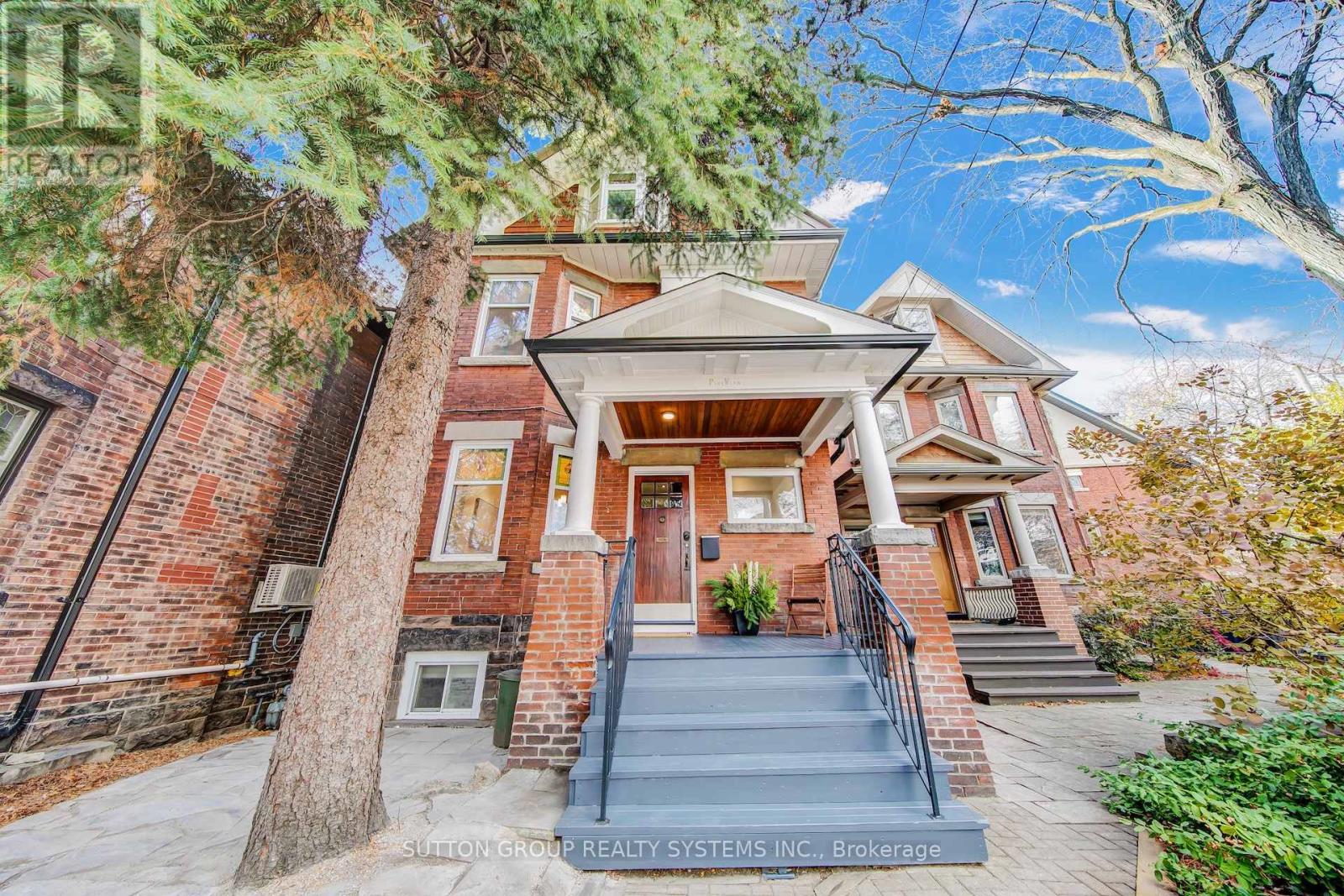 Welcome to this exceptional, charm-filled residence in the heart of High Park North. This Bright & elegant 1920's 3-storey detached brick home preserves its original architectural features, including original stained-glass windows, restored ceiling plaster casts & custom-made Douglas Fir post & beam features, among others. Full of character, this 4+1Bed & 5 Full Baths sits on one of the most desirable streets. Steps from top-rated schools: St. Cecilia's Catholic Elem. School, Runnymede P.S., Ursula Franklin Academy, and Humberside C.I.. Enjoy easy access to Bloor W. Village, High Park, Junction, shops, cafés, restaurants, transit & more. Offering remarkable versatility, this home can serve as a spacious single-family or a multi-generational property. The fully finished basement-featuring a separate entrance, 7Ft ceilings, full kitchen, spa-like bathroom, and large living space - provides an excellent investment opportunity. Main Floor: Soaring 9.5Ft ceilings, a gracious foyer, elegant French doors, stained-glass windows, original wood trim & a pocket door between living/dining rooms. The renovated white kitchen offers ample storage & a bright breakfast nook. A modern 3-piece bath & a sun-filled solarium/mudroom opens to the picturesque backyard. Second Floor: A spacious family room with its own kitchen flows into a four-season solarium-currently used as a bedroom-with fully insulated brick to brick Loewen Heat Smart windows overlooking backyard. A 2nd bedroom with stained-glass details & a private den/home office, plus 2 full baths complete this highly functional level. Hardwood floors throughout add to the home's inviting character. Third Floor: 2 big bedrooms with exposed wood beams & a gorgeous renovated skylit bathroom. One bedroom walks out to a private 11x14Ft terrace-an ideal unwinding retreat. Backyard Escape: A This "Muskoka" feel, serene, tree-lined oasis with year-round evergreens; new deck, Owen Sound flagstone patio & lounging areas. A total Must See! (id:48254)