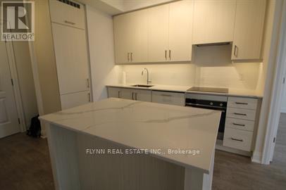 2001 - 36 Elm Drive W, Mississauga, Ontario  L5B 0N3 - Photo 4 - W12570774