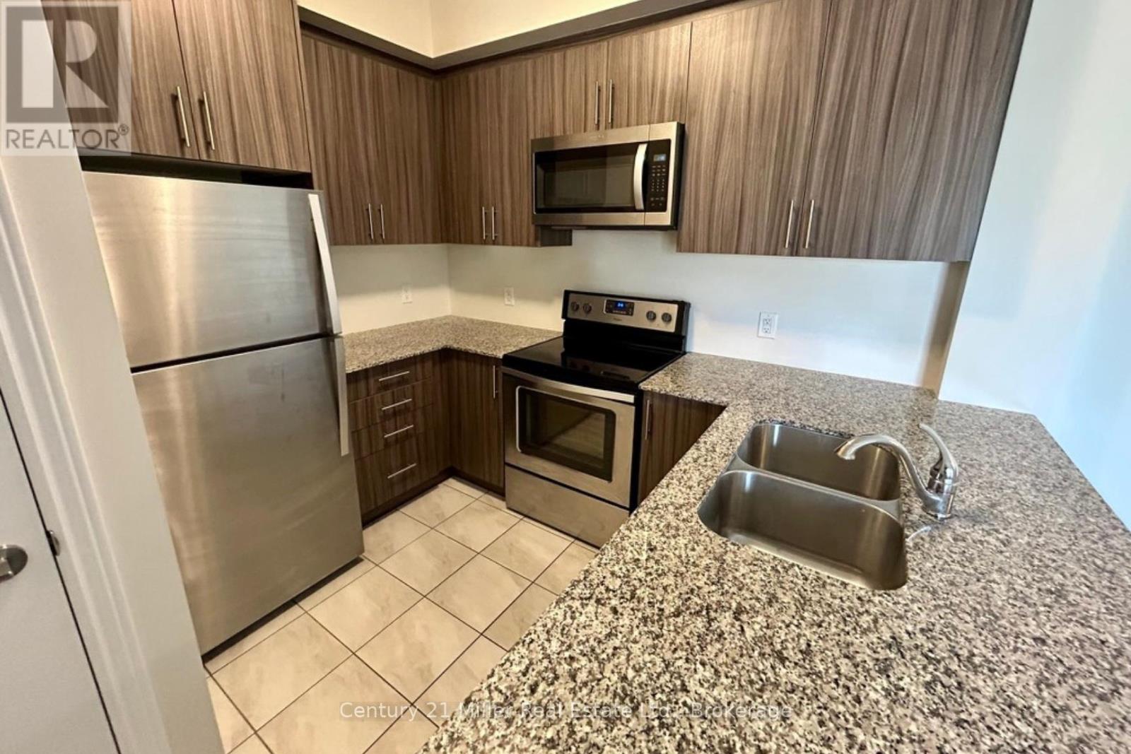 302 - 2370 Khalsa Gate, Oakville, Ontario  L6M 1P5 - Photo 9 - W12570854