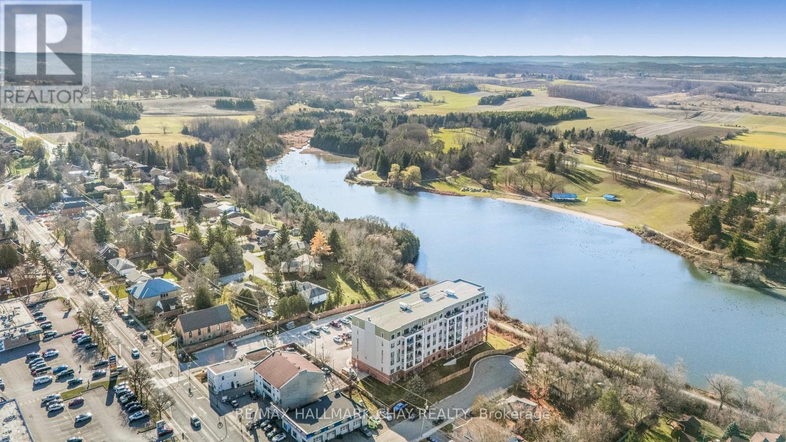 107 - 64 Queen Street S, New Tecumseth, Ontario  L0G 1W0 - Photo 2 - N12570812