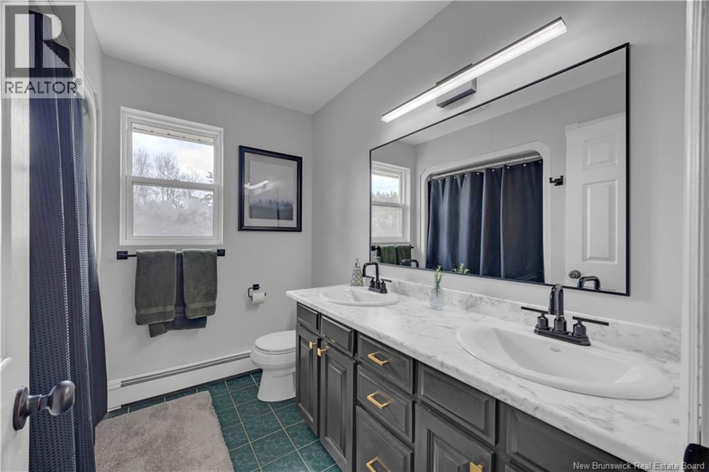 16 Mackinnon Drive, Nauwigewauk, New Brunswick  E5N 6X4 - Photo 21 - NB130509