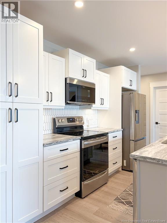 24 Riverview Drive Unit# 103, Somerville, New Brunswick E7P 3B4 - Photo 15 - NB124061