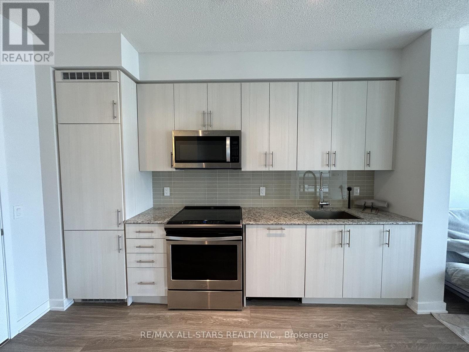 1003 - 4085 Parkside Village Drive, Mississauga, Ontario  L5B 0K9 - Photo 2 - W12571318