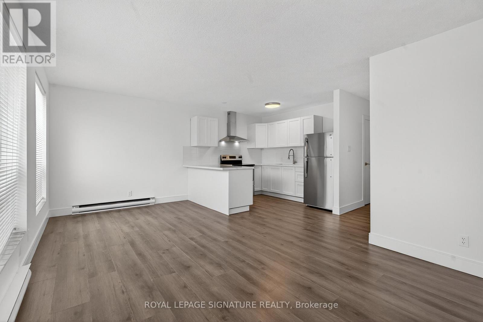3 - 215 Danforth Avenue, Toronto, Ontario  M4K 1N2 - Photo 2 - E12571556