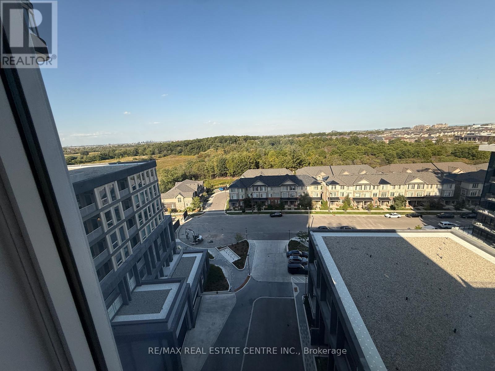 1003 - 3240 William Coltson Avenue, Oakville, Ontario L6H 8C8 - Photo 11 - W12402384