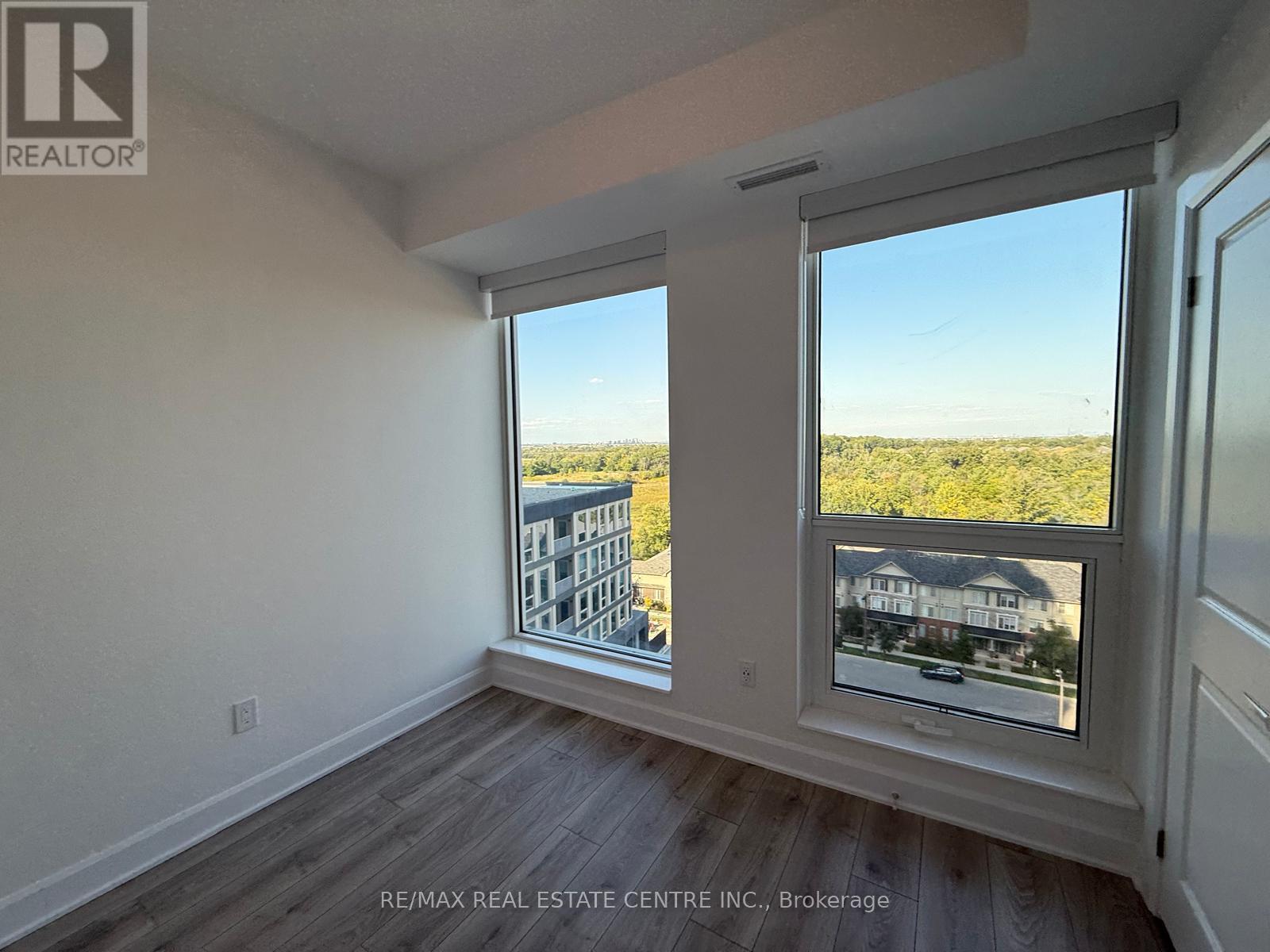 1003 - 3240 William Coltson Avenue, Oakville, Ontario L6H 8C8 - Photo 12 - W12402384