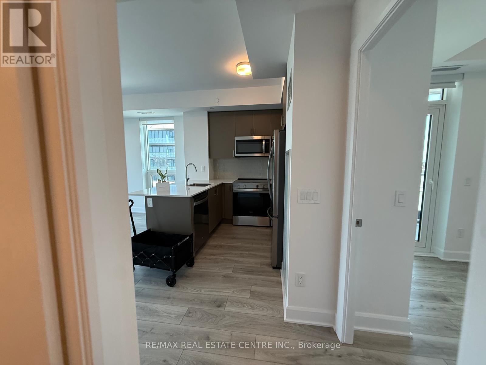 1003 - 3240 William Coltson Avenue, Oakville, Ontario L6H 8C8 - Photo 3 - W12402384