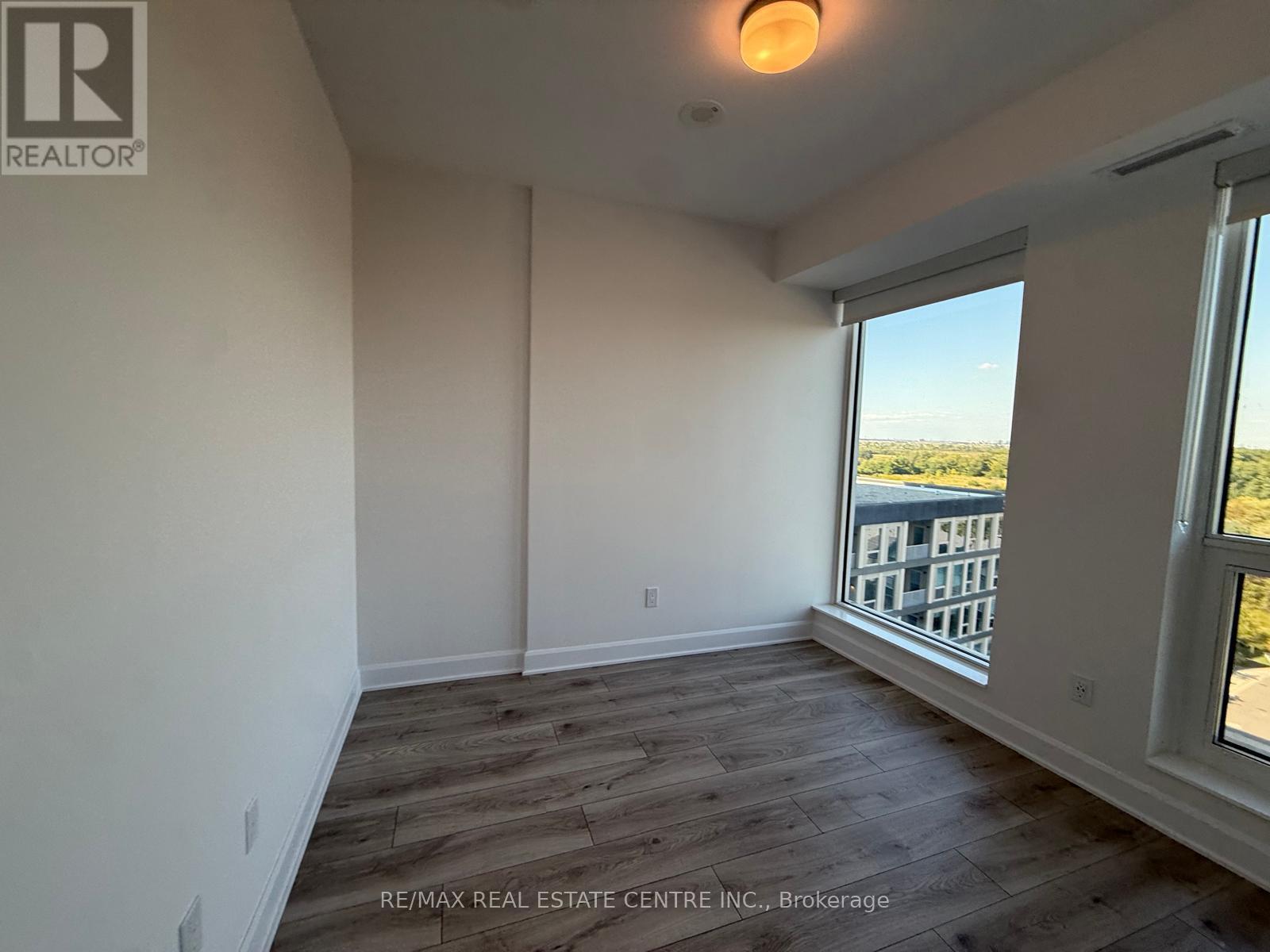 1003 - 3240 William Coltson Avenue, Oakville, Ontario L6H 8C8 - Photo 13 - W12402384