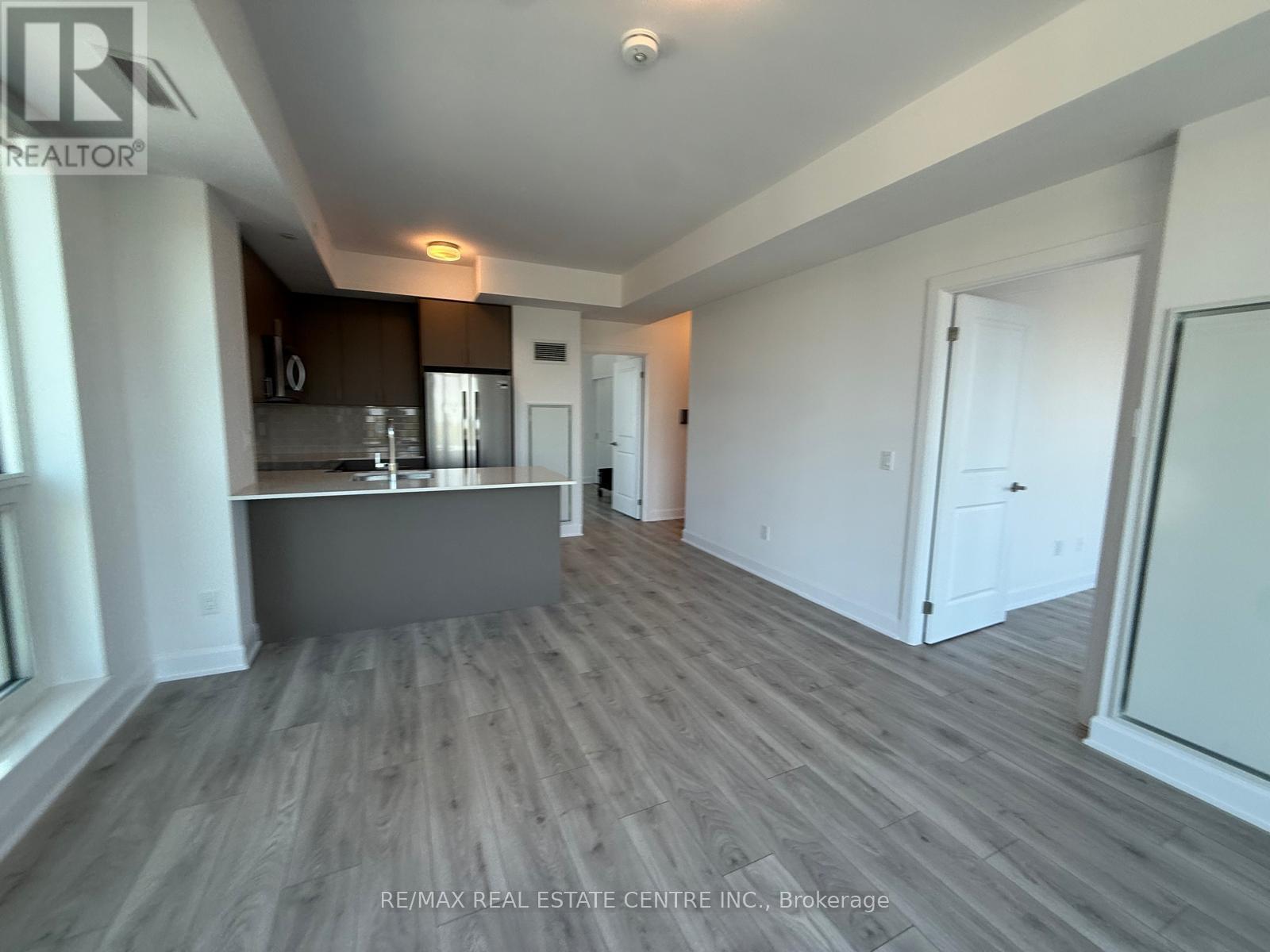 1003 - 3240 William Coltson Avenue, Oakville, Ontario L6H 8C8 - Photo 4 - W12402384