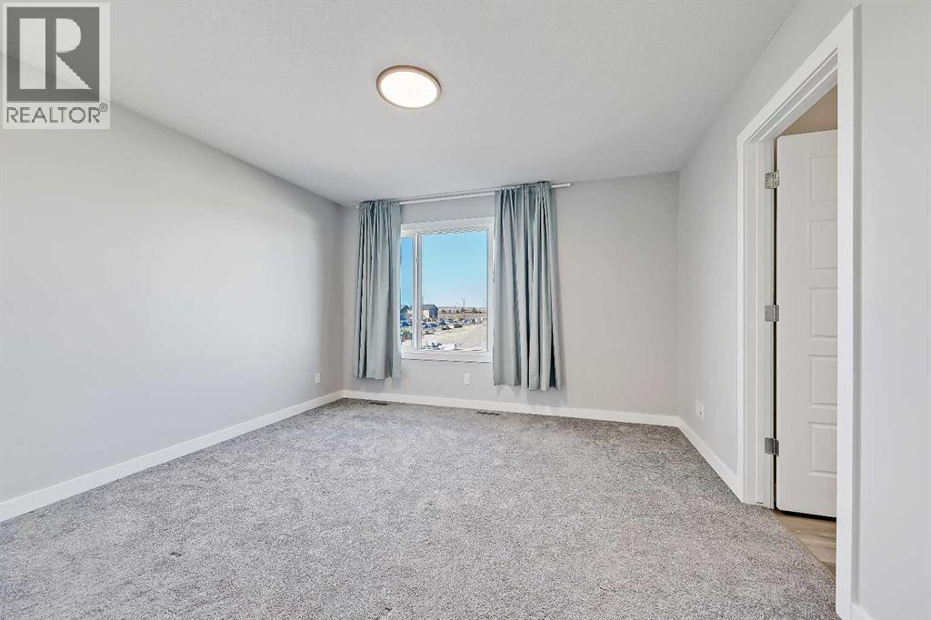 78 Larkspur Bend, Okotoks, Alberta  T1S 4E6 - Photo 15 - A2267425