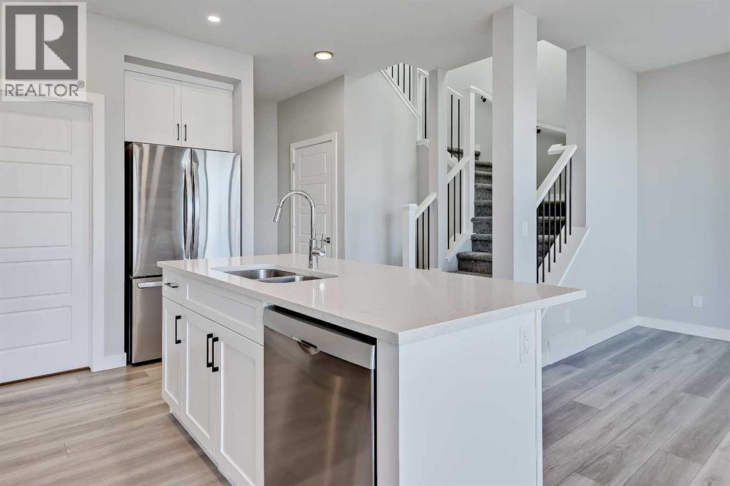 78 Larkspur Bend, Okotoks, Alberta  T1S 4E6 - Photo 5 - A2267425