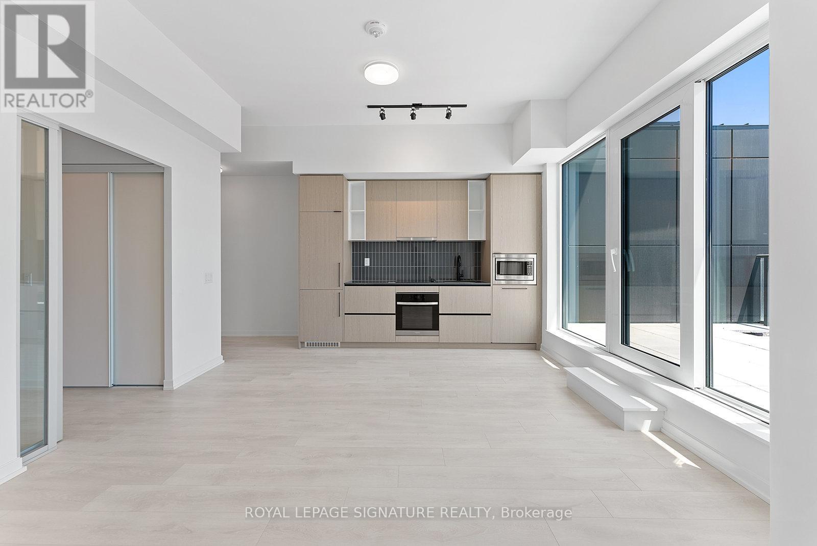 601 - 10 Graphophone Grove, Toronto, Ontario M6H 0E5 - Photo 8 - W12557954