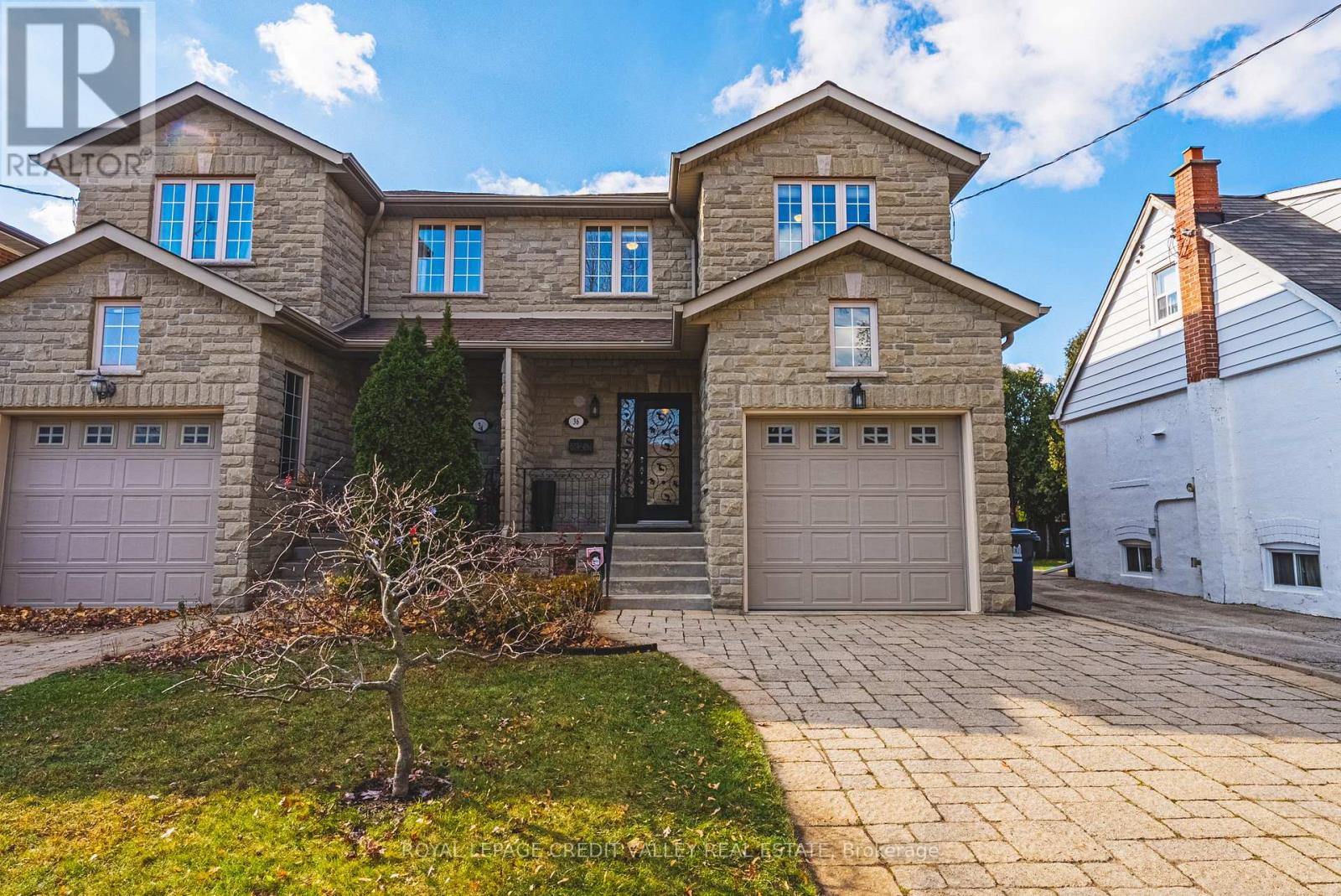 36 Lunness Road, Toronto, Ontario  M8W 4M4 - Photo 2 - W12571788