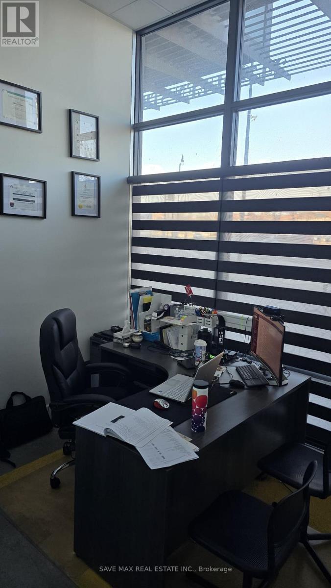 106 - 247 Queen Street E, Brampton, Ontario  L6W 0B8 - Photo 2 - W12572270