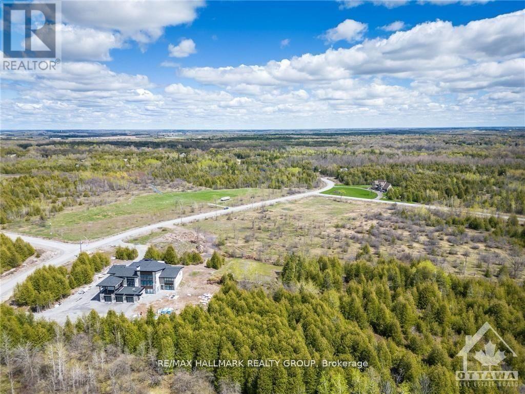 7891 Iveson Drive, Ottawa, Ontario  K0A 2P0 - Photo 5 - X12572350