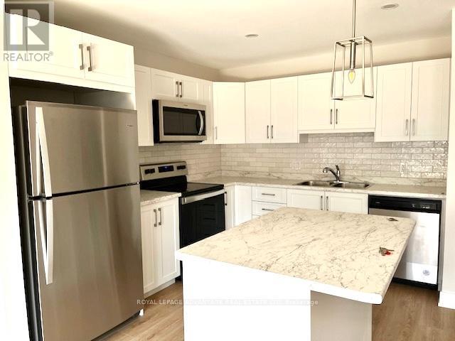 69 Whitcomb Crescent, Smiths Falls, Ontario  K7A 0A2 - Photo 4 - X12572418