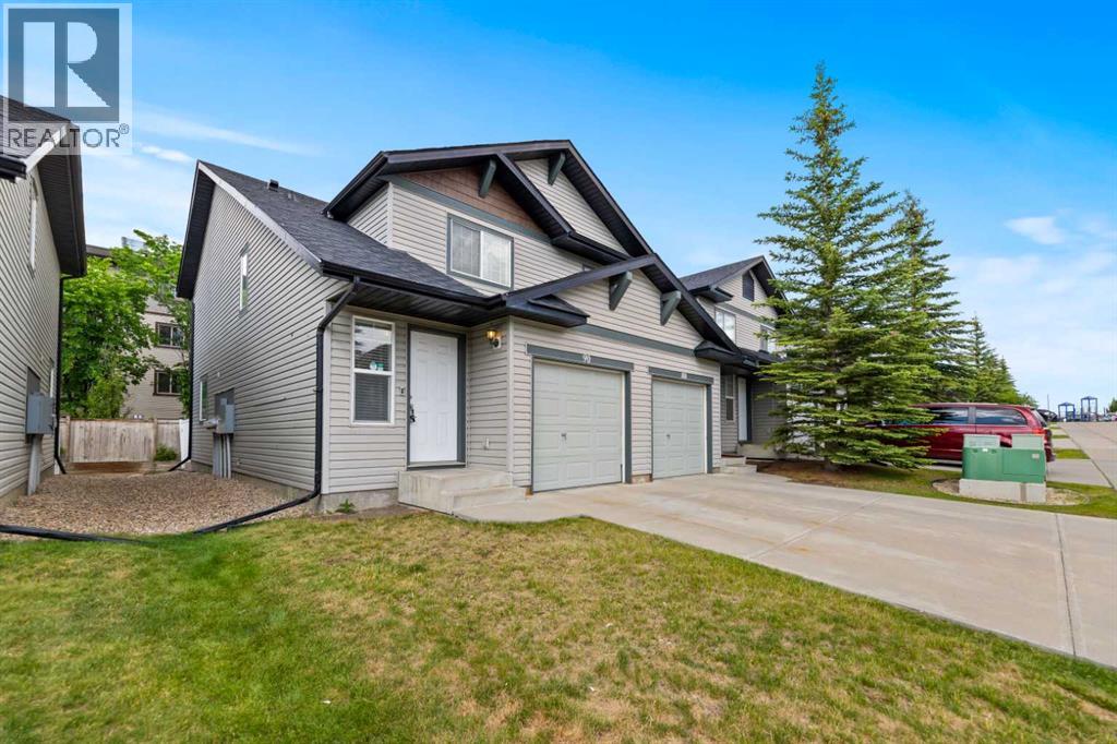 90 Panatella Villas Nw, Calgary, Alberta  T3K 0G6 - Photo 3 - A2235847