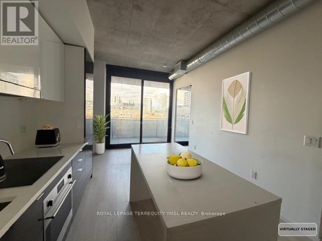 612 - 21 Lawren Harris Square, Toronto, Ontario  M5A 0T4 - Photo 8 - C12475042