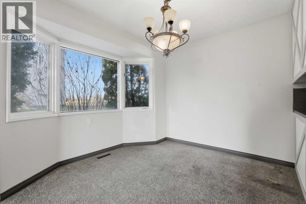 303 Pinestream Place Ne, Calgary, Alberta  T1Y 3A5 - Photo 7 - A2269441