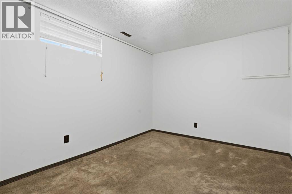 303 Pinestream Place Ne, Calgary, Alberta  T1Y 3A5 - Photo 28 - A2269441