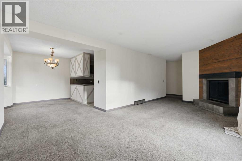 303 Pinestream Place Ne, Calgary, Alberta  T1Y 3A5 - Photo 5 - A2269441