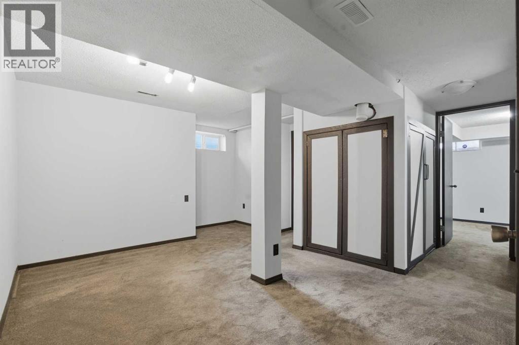 303 Pinestream Place Ne, Calgary, Alberta  T1Y 3A5 - Photo 23 - A2269441