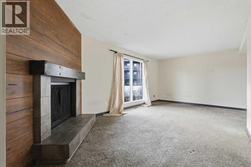 303 Pinestream Place Ne, Calgary, Alberta  T1Y 3A5 - Photo 3 - A2269441