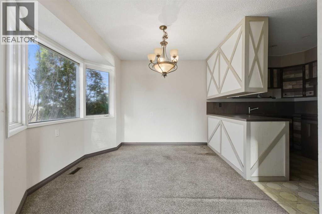 303 Pinestream Place Ne, Calgary, Alberta  T1Y 3A5 - Photo 6 - A2269441