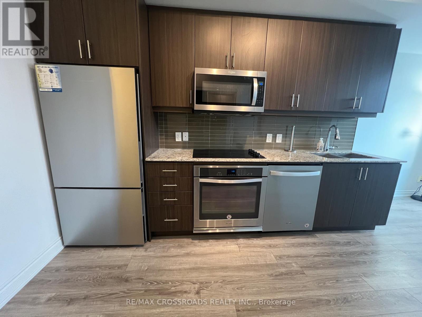 202 - 9618 Yonge Street, Richmond Hill, Ontario  L4C 0X5 - Photo 7 - N12572836