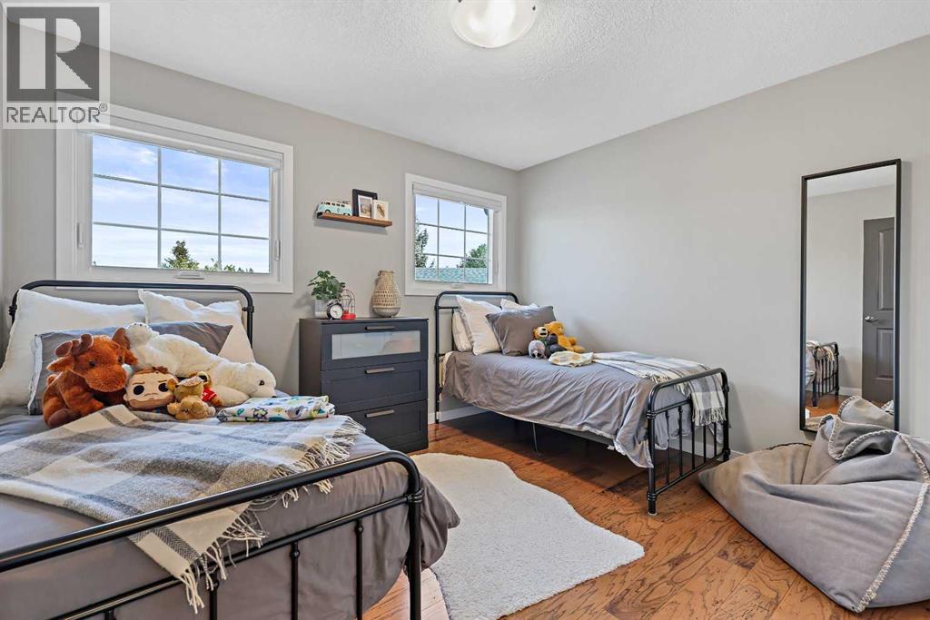 33 Sunset Crescent, Okotoks, Alberta  T1S 1P3 - Photo 31 - A2272168