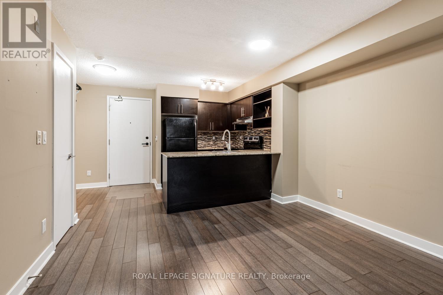 221 - 120 Dallimore Circle, Toronto, Ontario  M3C 4J1 - Photo 3 - C12573020