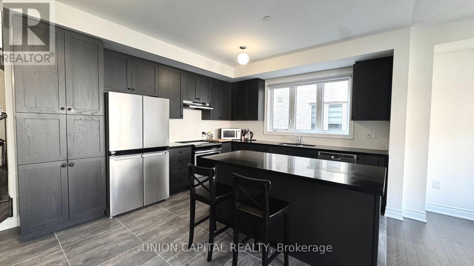 63 Erintol Way, Markham, Ontario  L3S 0E7 - Photo 2 - N12573148